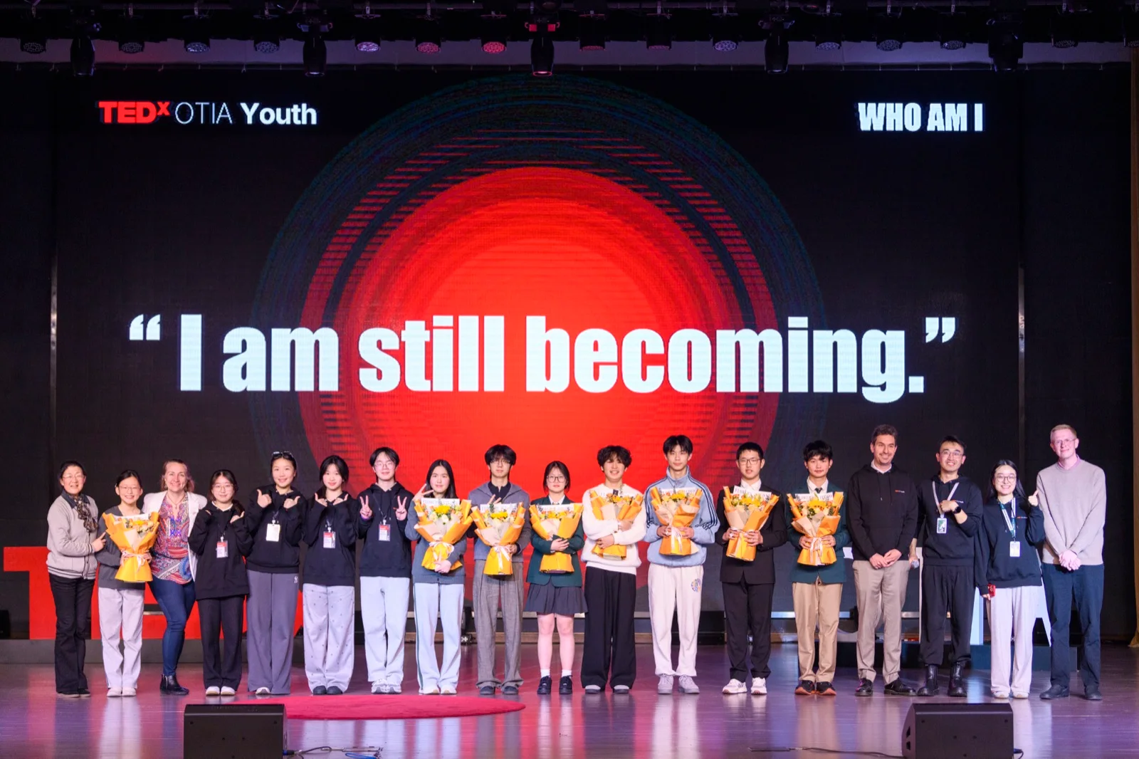 Students and team on stage at TEDxOTIA Youth